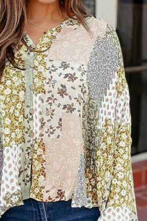 a close up of a woman wearing a blouse and jeans