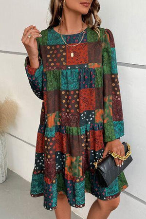 a woman wearing a multicolored dress