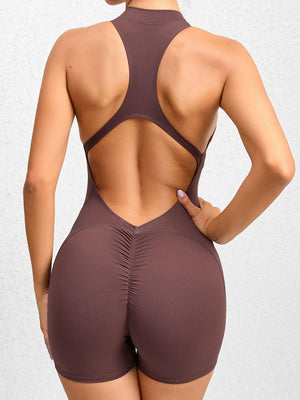 the back of a woman in a brown bodysuit