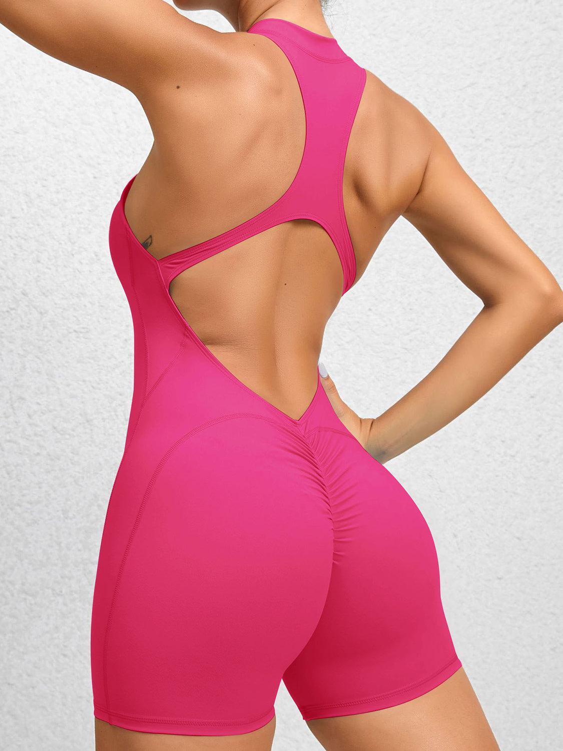 the back of a woman in a pink sports suit
