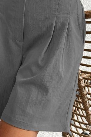 a close up of a person wearing shorts