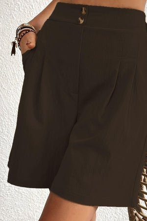 a close up of a person wearing a skirt