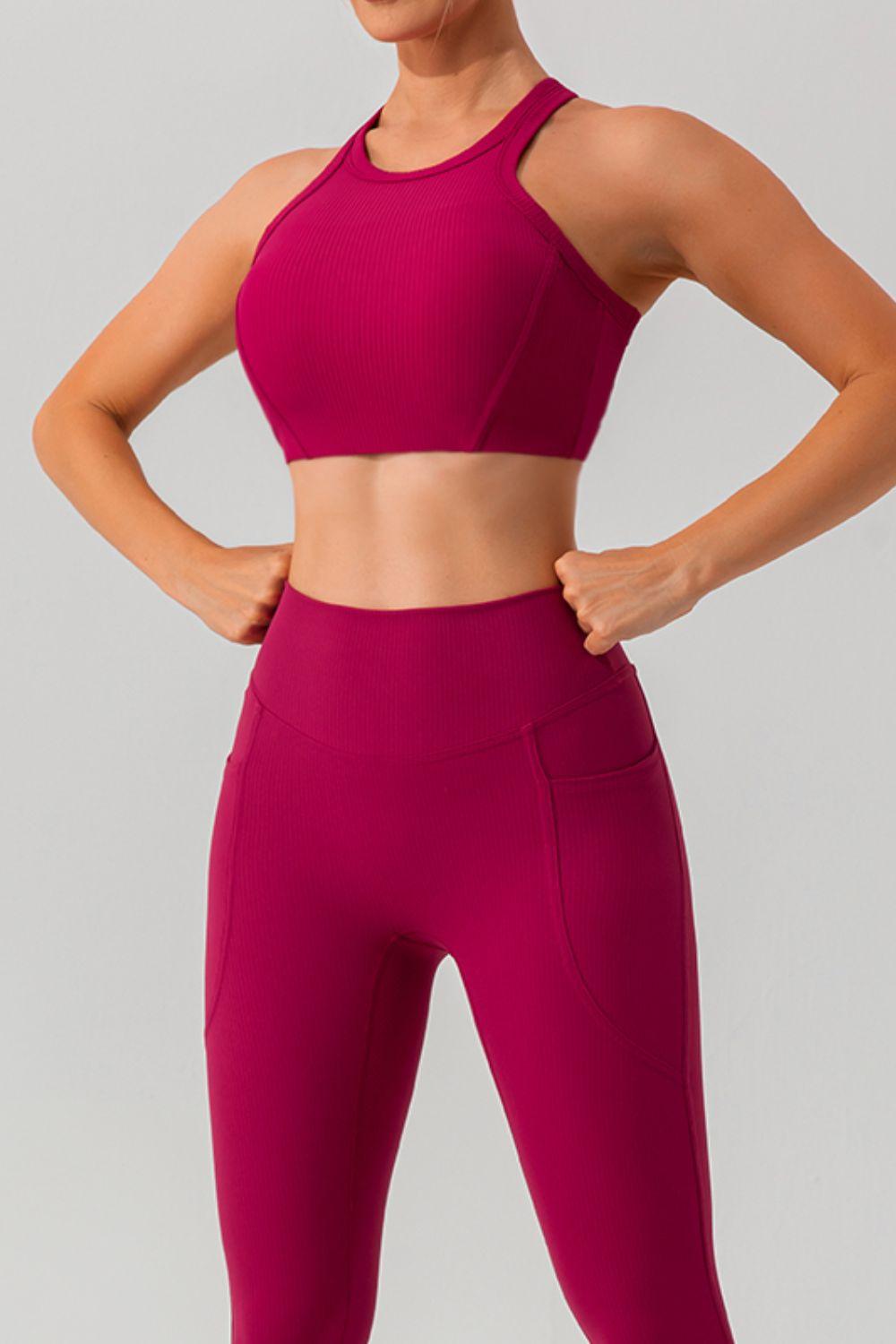 a woman in a pink sports bra top and leggings