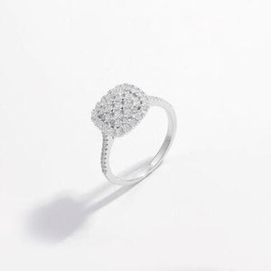 a diamond ring on a white background