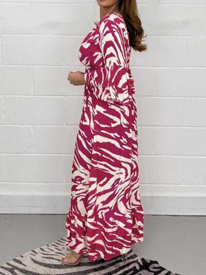 a woman standing on a zebra print rug