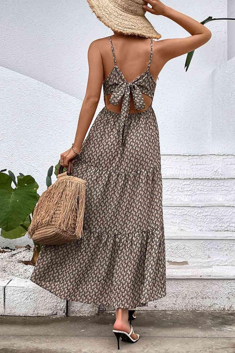 a woman wearing a hat and a dress