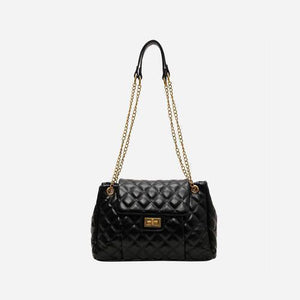 a black handbag with a gold chain strap