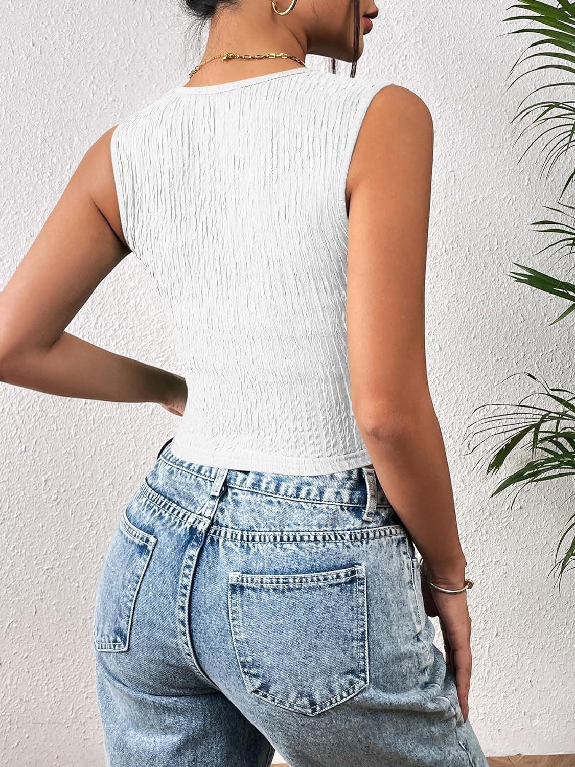 a woman wearing high waist jeans and a white top