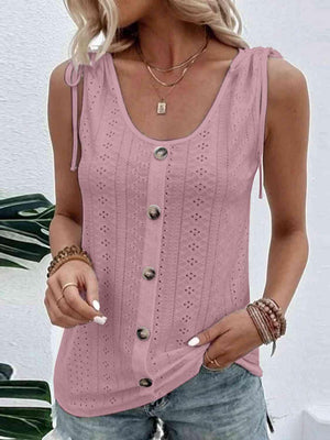 a woman wearing a pink tank top