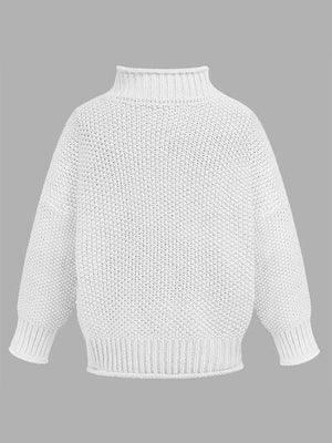 a white sweater with a high neck and long sleeves