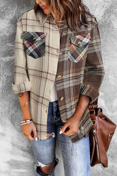 a woman wearing ripped jeans and a plaid shirt