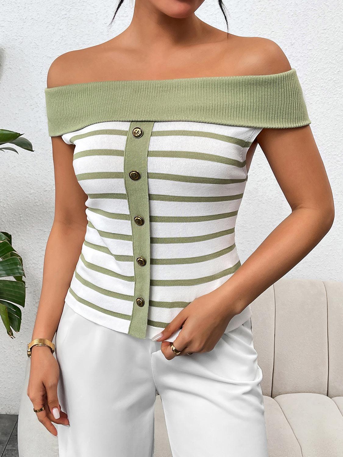 a woman wearing a green and white striped top