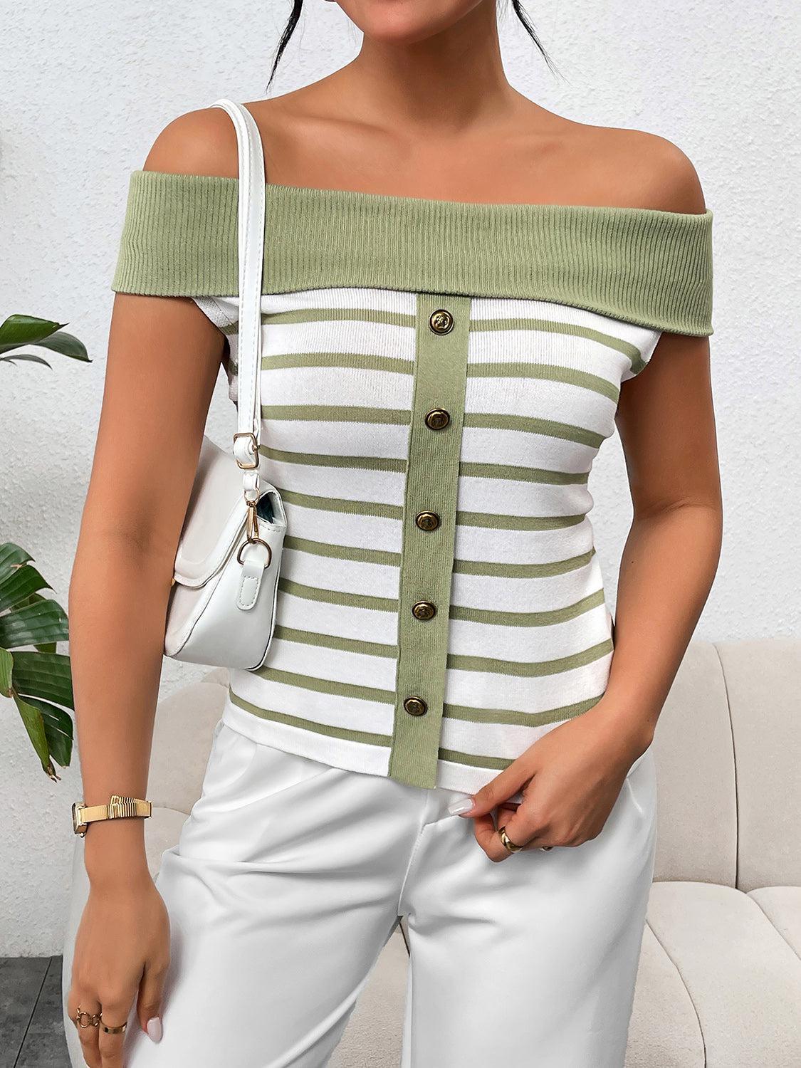 a woman wearing a green and white striped top