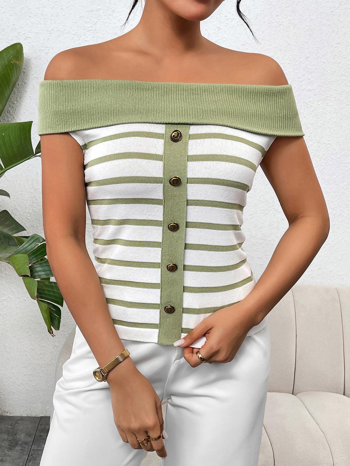 a woman wearing a green and white striped top