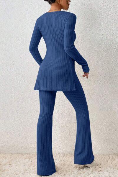 a woman in a blue sweater and pants