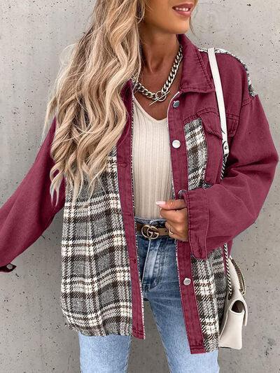 a woman wearing a red jacket and jeans