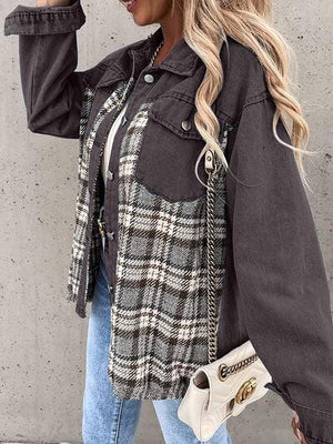 a woman wearing a black and white plaid jacket