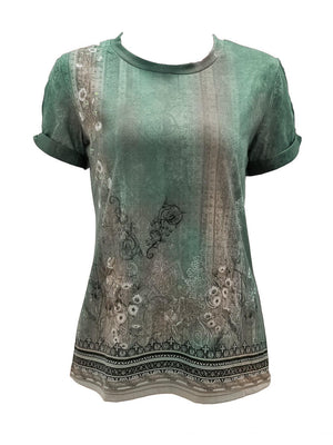 a women's green top with a floral design