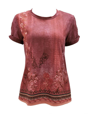 a women's top with a floral design on it