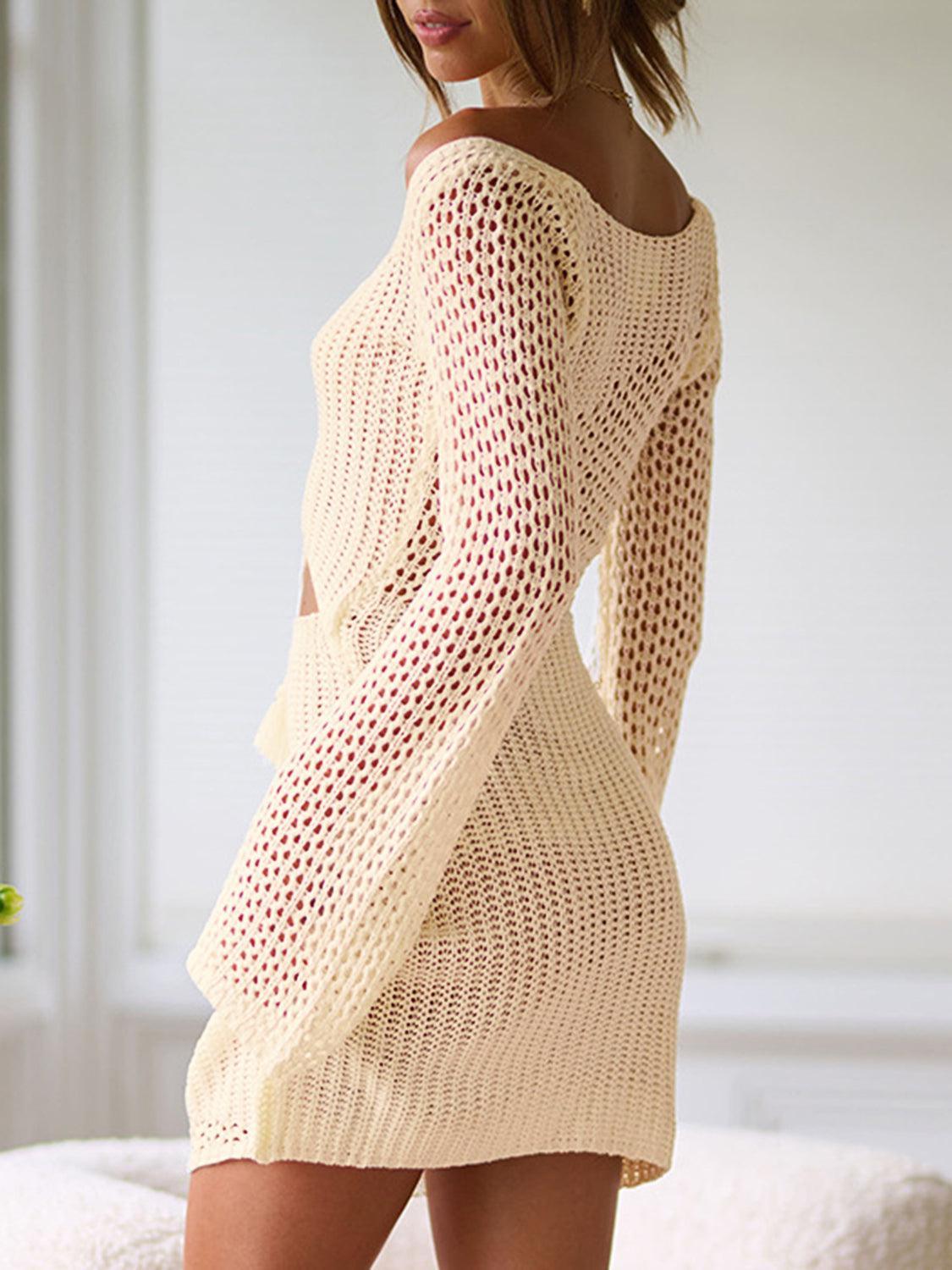 a woman standing on a bed in a short dress