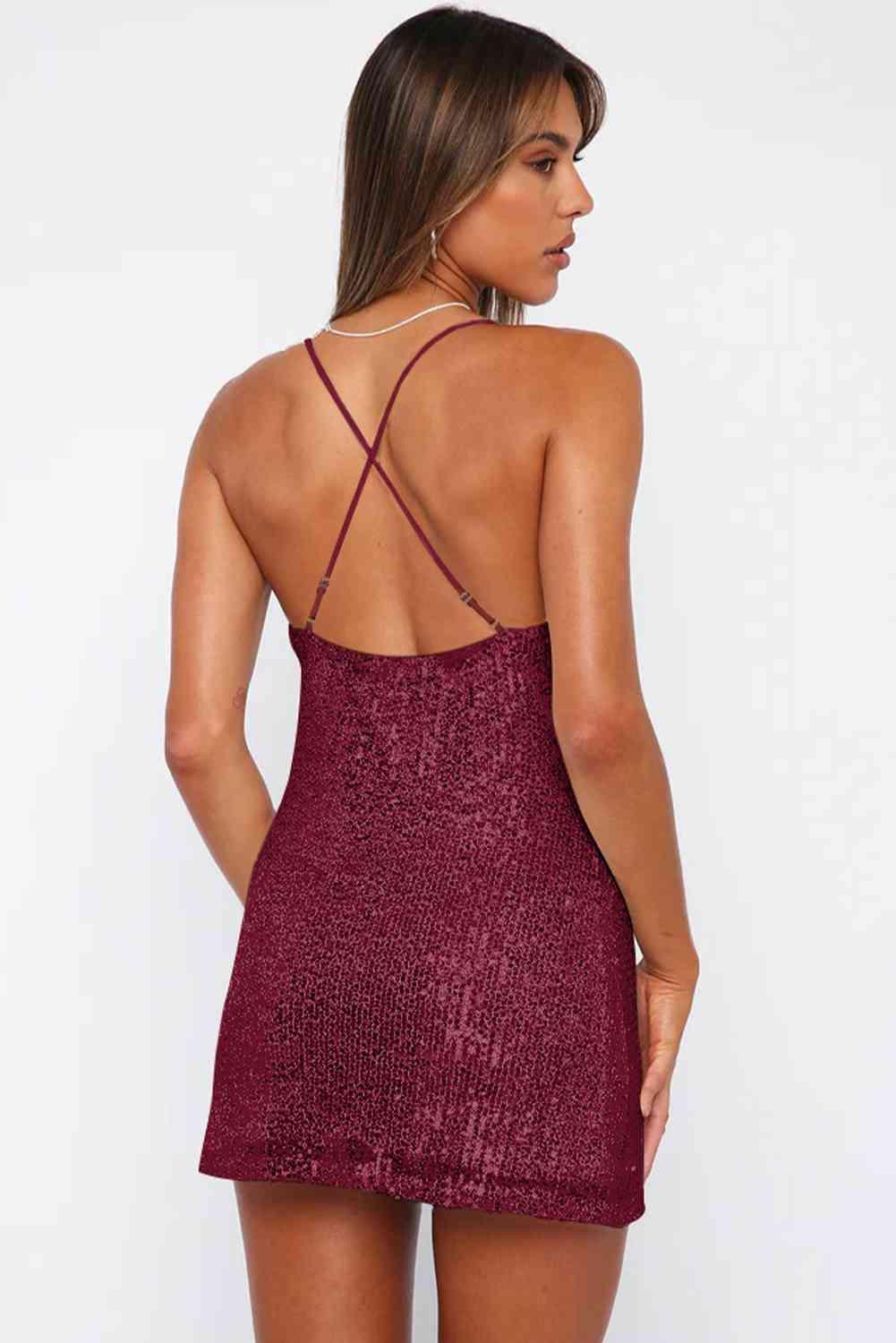 a woman wearing a burgundy dress