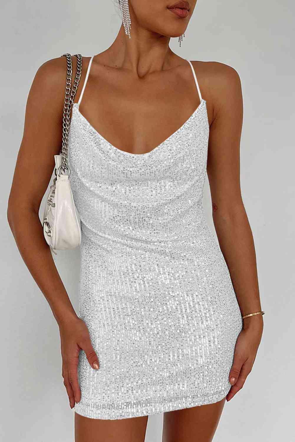 a woman in a short white dress