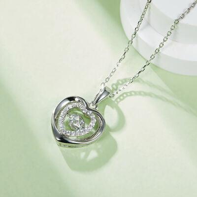 a diamond heart pendant on a chain