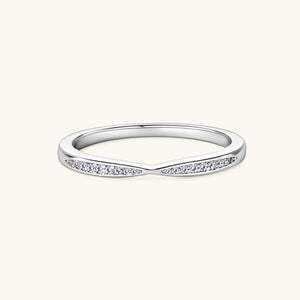 a white gold wedding band with diamonds