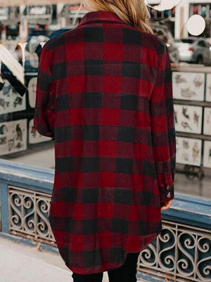 a woman in a red and black checkered shirt