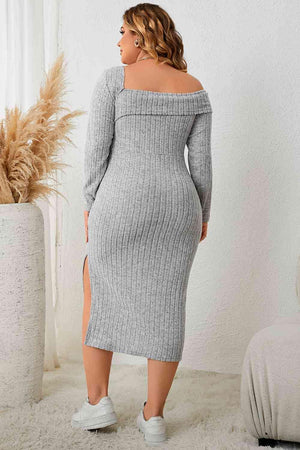 a woman in a grey sweater dress