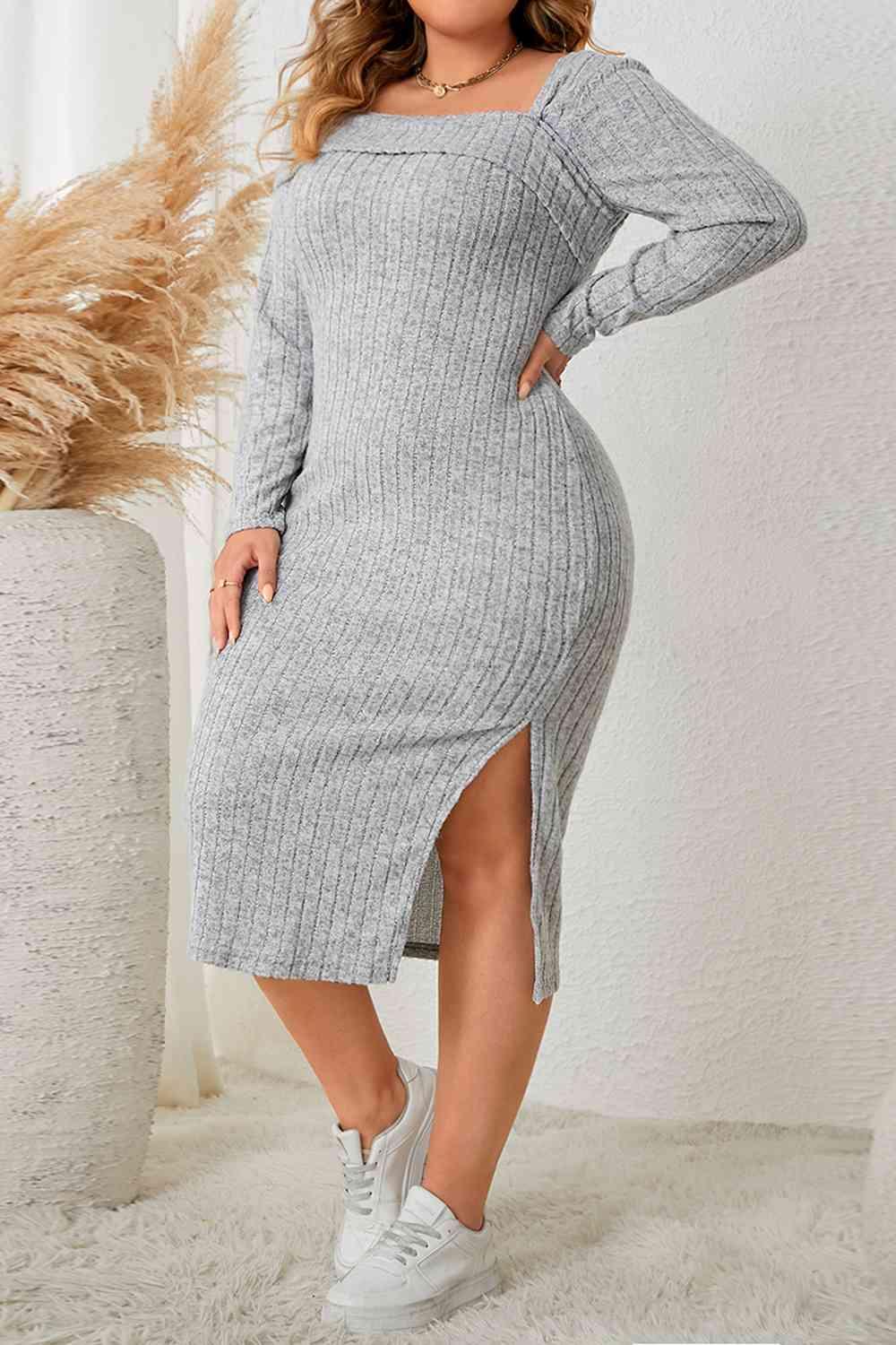 a woman in a grey sweater dress