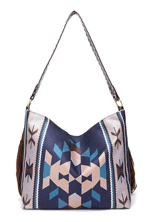 a blue and white bag with a brown handle