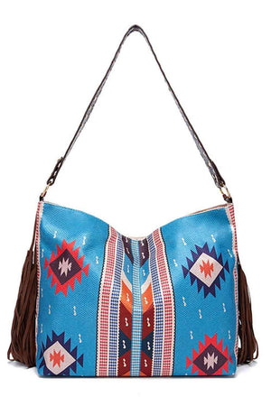 a blue purse with a tasselled handle