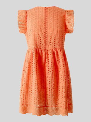 an orange dress is hanging on a hanger