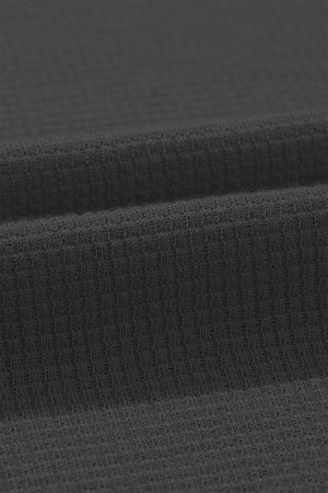 a close up of a dark gray fabric
