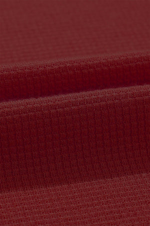 a close up of a red fabric