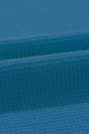 a close up of a blue fabric