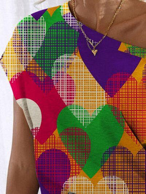 a woman wearing a multicolored dress and a necklace