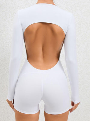 the back of a woman wearing a white bodysuit