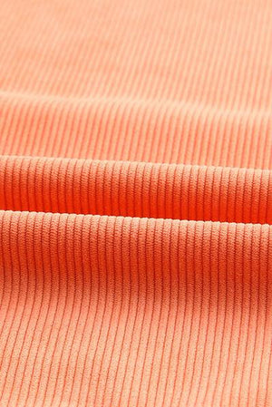 a close up view of an orange fabric