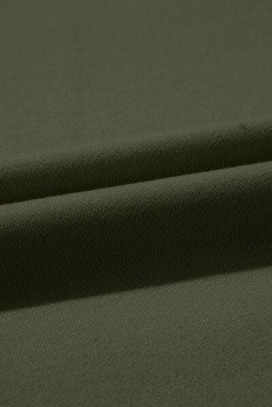 a close up shot of a plain green fabric