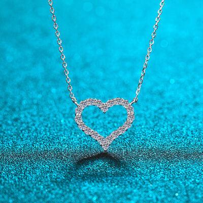 a heart shaped necklace on a blue background
