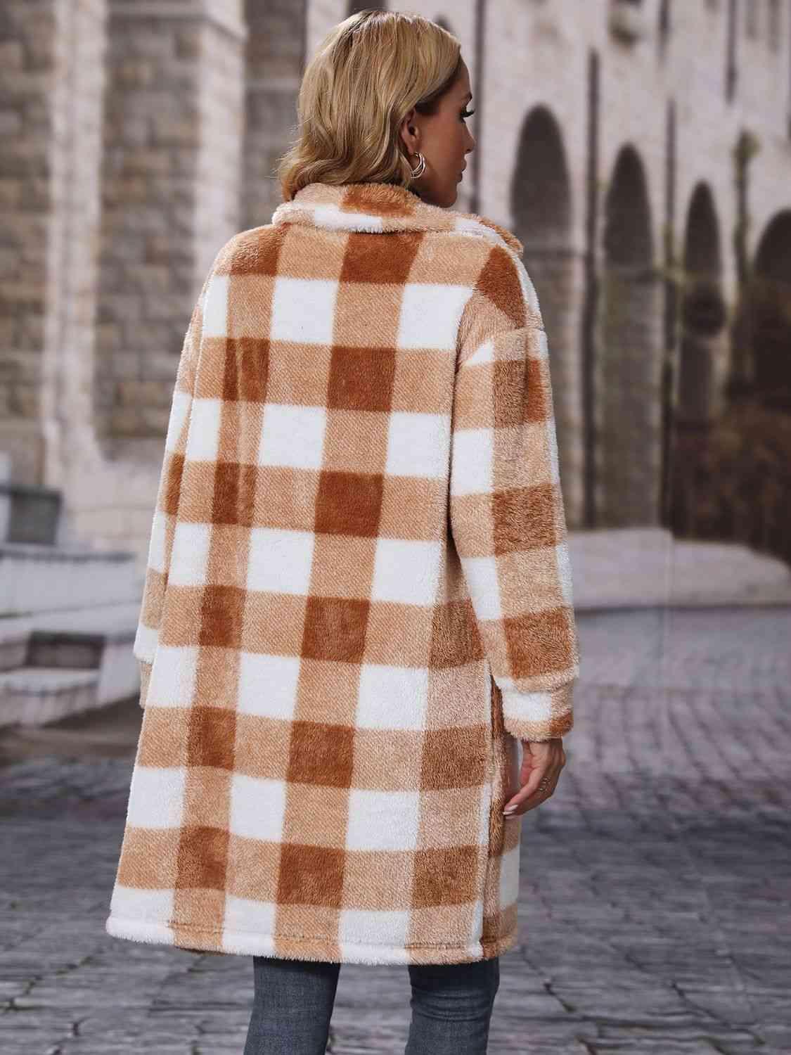 a woman wearing a brown and white checkered coat