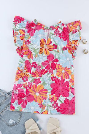 a top with flowers and a pair of shorts