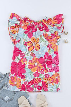 a pair of shoes and a top on a white background