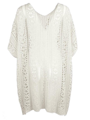 a white knitted top with short sleeves