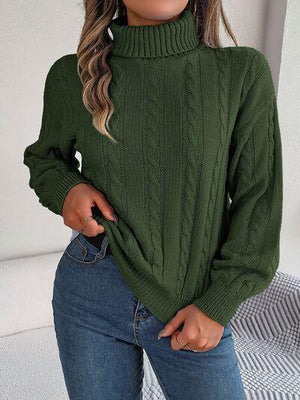 a woman wearing a green turtle neck sweater