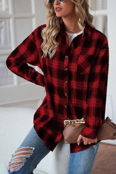 a woman wearing a red and black plaid shirt