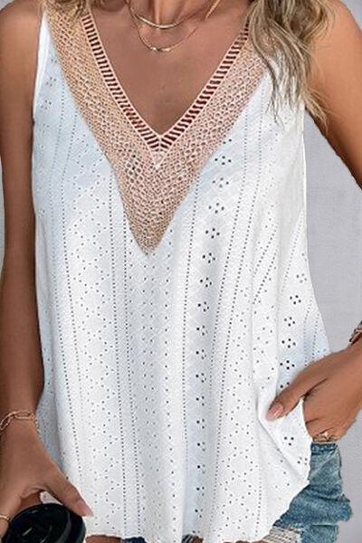 a woman wearing a white top and jeans