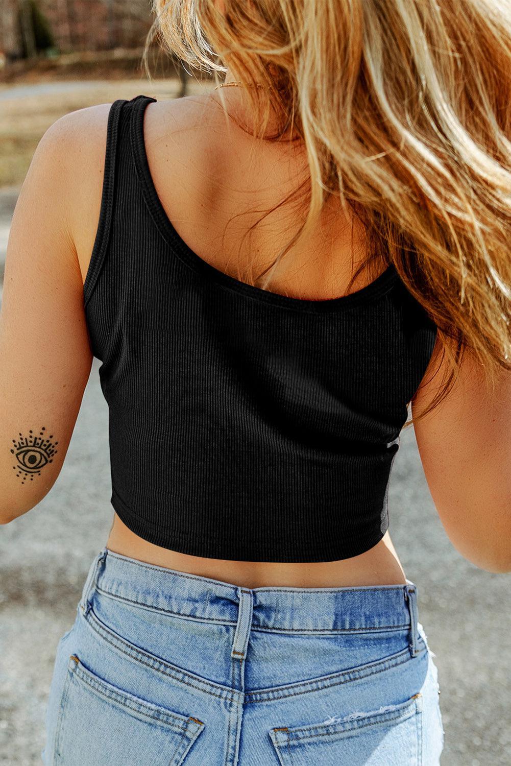 a woman with a tattoo on her left arm